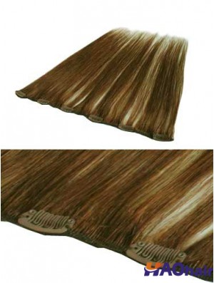 Belle pince à cheveux remy droite brune dans les extensions de cheveux