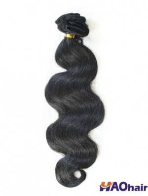 Ruban dans les extensions de cheveux avec un style ondulé de couleur noire Remy