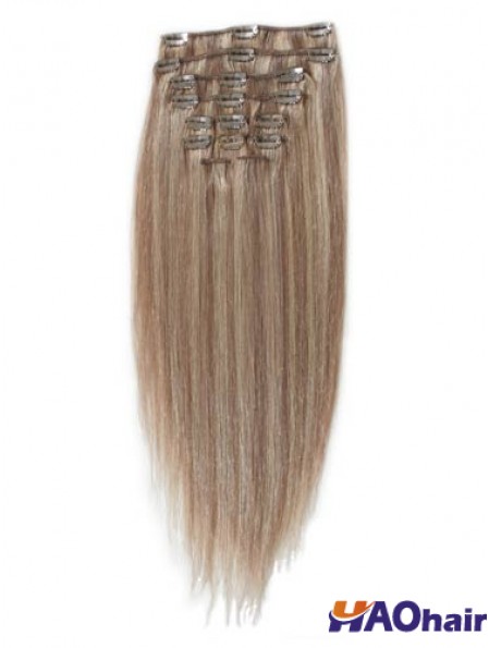 Grande pince à cheveux remy blonde droite dans les extensions de cheveux