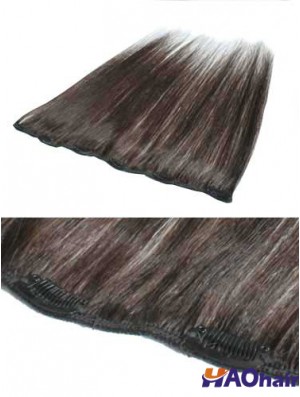 Superbe pince à cheveux remy droite brune dans les extensions de cheveux