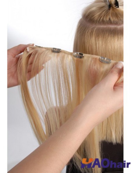 Agrafe droite blonde de cheveux remy de flexibilité dans des prolongements de cheveux